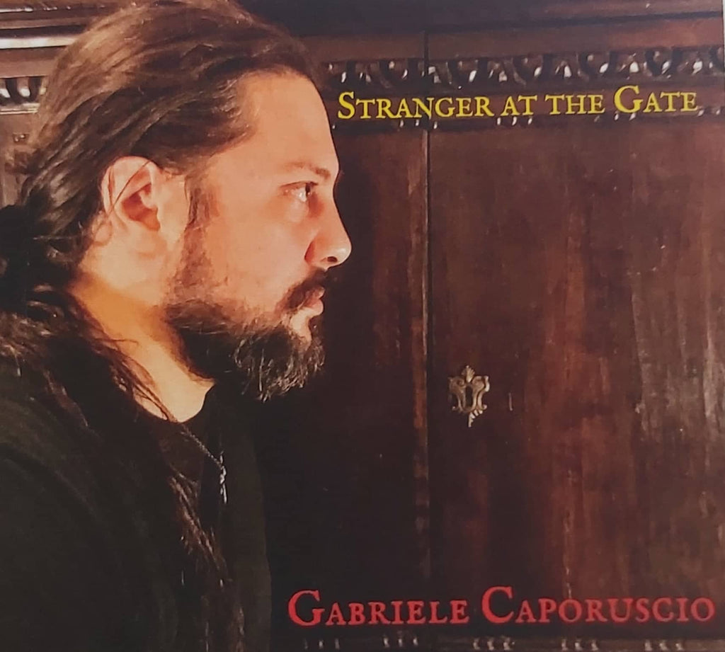 Gabriele Caporuscio <h4> Stranger At The Gate